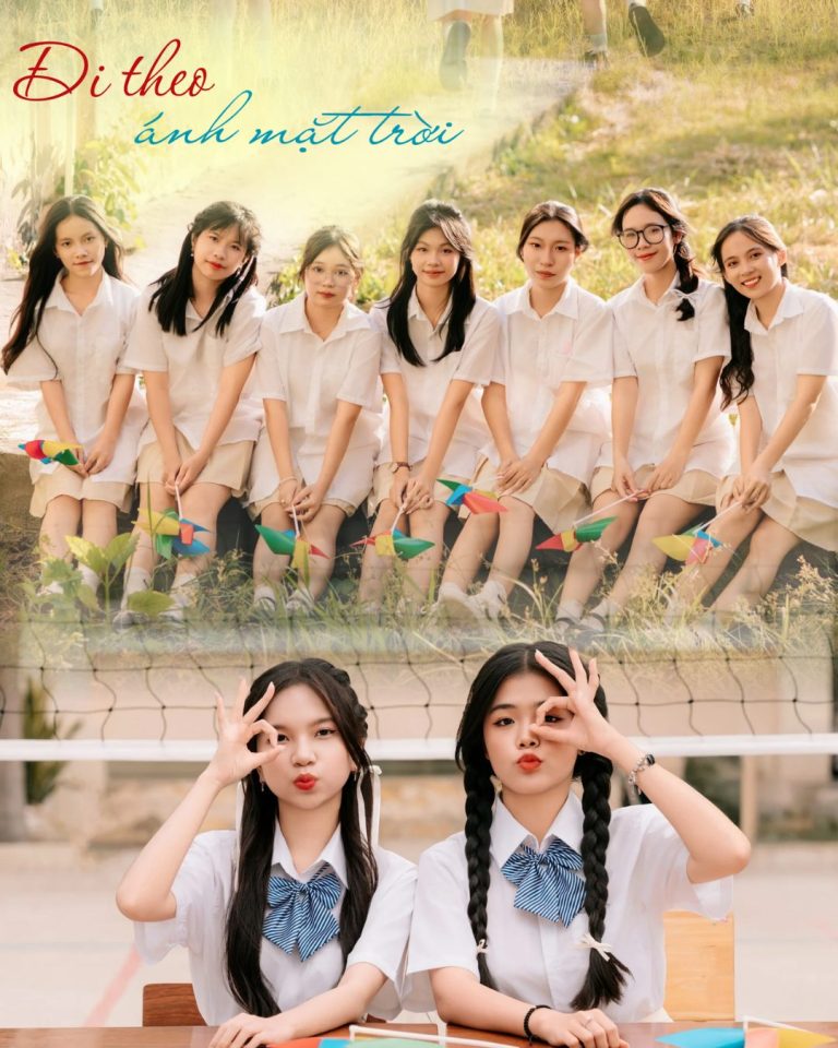 Nữ sinh cầm hoa và hai bạn tạo dáng cạnh bàn học
